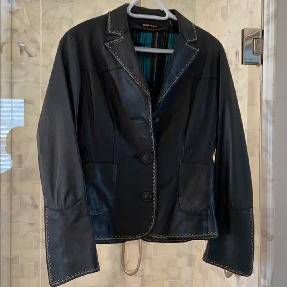 Boutique black leather jacket. Fits like a size 12